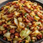 Bacon Fried Cabbage with crispy bacon, tender cabbage, onion, garlic, butter, and savory seasonings