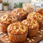Banana Oat Muffins with ripe bananas, rolled oats, soft golden tops, and a moist homemade breakfast texture