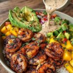 Shrimp Avocado Bowls with juicy shrimp, avocado, rice, tomatoes, cucumber, corn, black beans, and lime dressing